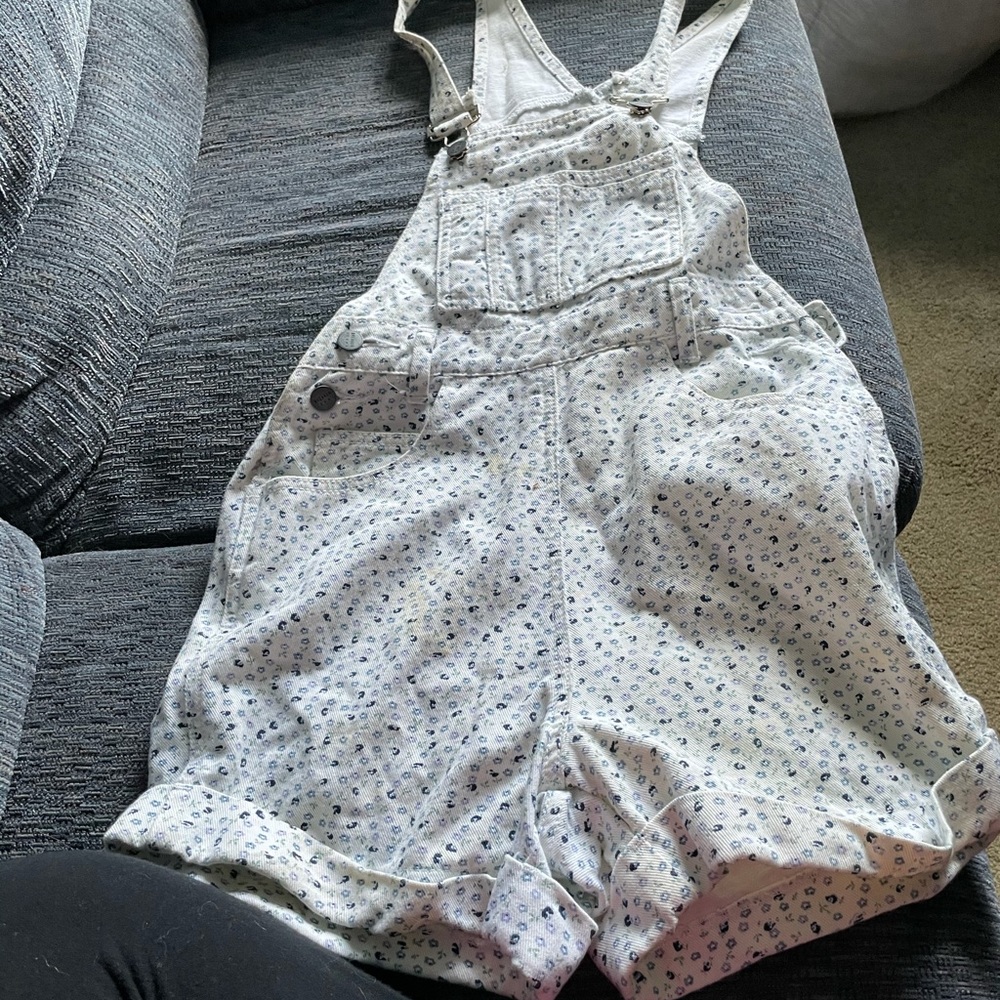 Vintage white overall shorts with blue flowers
